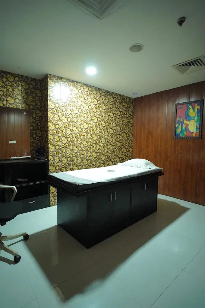 Private treatment room with massage bed at Alma Thai Spa